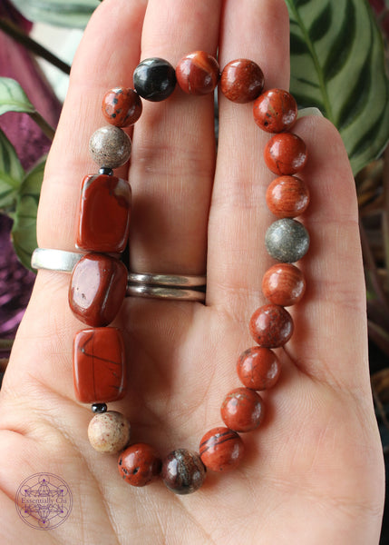 chunky red jasper bracelet has three rectangular tumble focal beads with 8mm brecciated red jasper beads to support your root chakra.