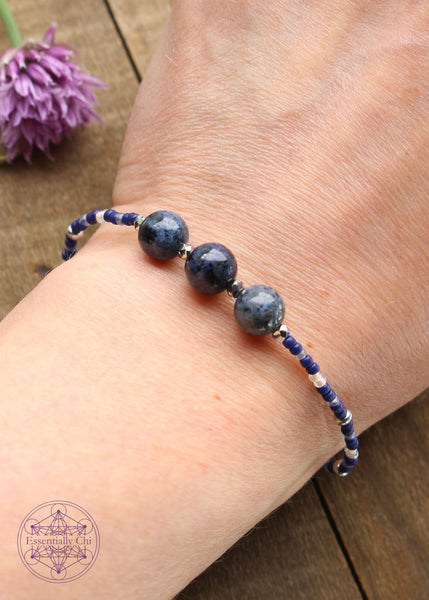 Beaded Stretchy Boho Stacker Bracelets.8mm Dumortierite beads with navy blue, grey, opalescent, and silver seed beads.
