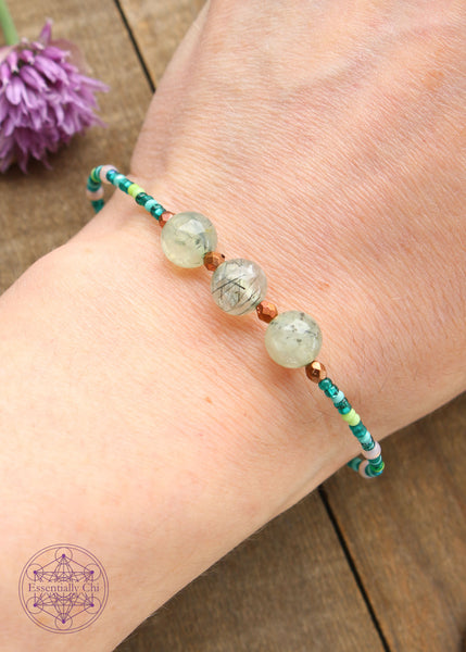 Beaded Stretchy Boho Stacker Bracelets. Prehnite with Epidote 8mm beads with sea foam , emerald colored, lime green, and copper seed beads.