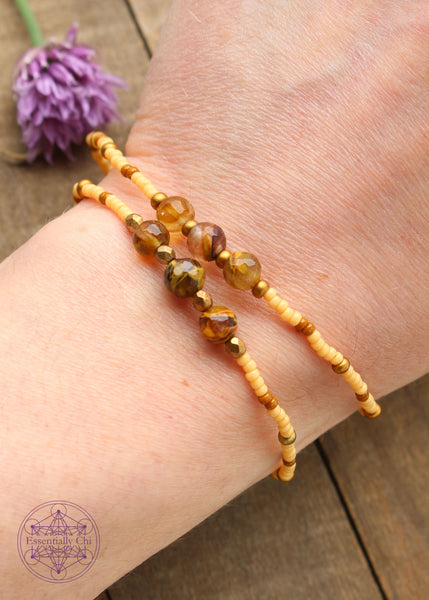 Beaded Stretchy Boho Stacker Bracelets. Faceted Golden Healer 6mm beads with buttercup yellow, caramel, and copper seed beads.