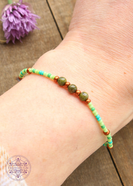 Beaded Stretchy Boho Stacker Bracelets. serpentine 4mm beads with lime green, sea foam, avocado and copper seed beads.