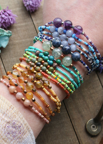 Beaded Stretchy Boho Stacker Bracelets all on the wrist to show available colors.