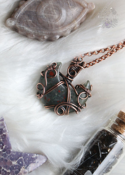 Dark Luna - African Bloodstone Moon Pendant Wire Wrapped in Copper with swirls wrapping around the moon for Witchy Energy Intuitives.