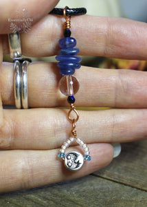Blue Kyanite & Clear Quartz Simple Copper Wire Wrapped Necklace - A versatile crystal pendant for enhanced communication and inner harmony, highlighting the moon charm at the bottom of the pendant.