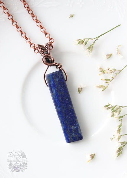 Elevate your energy with our Hera Lapis Lazuli Copper Wire Wrapped Pendant, designed for intuitive healing and self-expression. This exquisite piece resonates with the goddess's energy, promoting balance and wisdom in your spiritual journey.