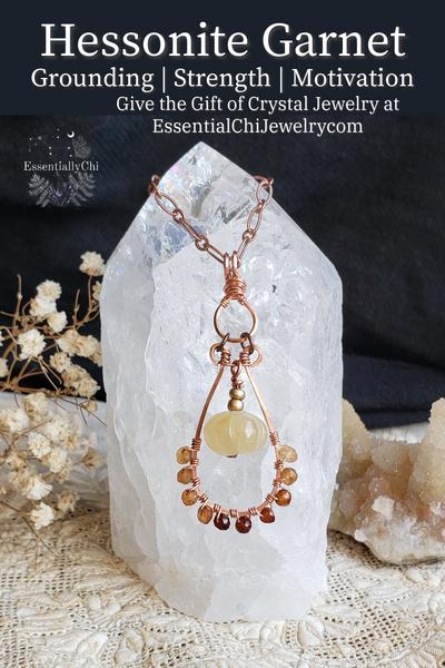 Hessonite Garnet and Yellow Jade Pumpkin Copper Wire Wrapped Necklace - A graceful celebration of autumn and warm hues, promoting vitality, joy, and wisdom. The hessonite garnet beads have an ombre color gradient along the bottom of the pendant and the yellow jade pumpkin dangles in the middle of the teardrop hoop setting. This is a very elegant design for those who love autumn jewelry and warm tones.