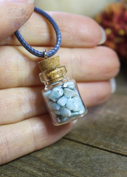 Larimar Crystal Chip Bottle Necklace - A dainty bottle pendant filled with Larimar chips, encouraging peace and clear communication