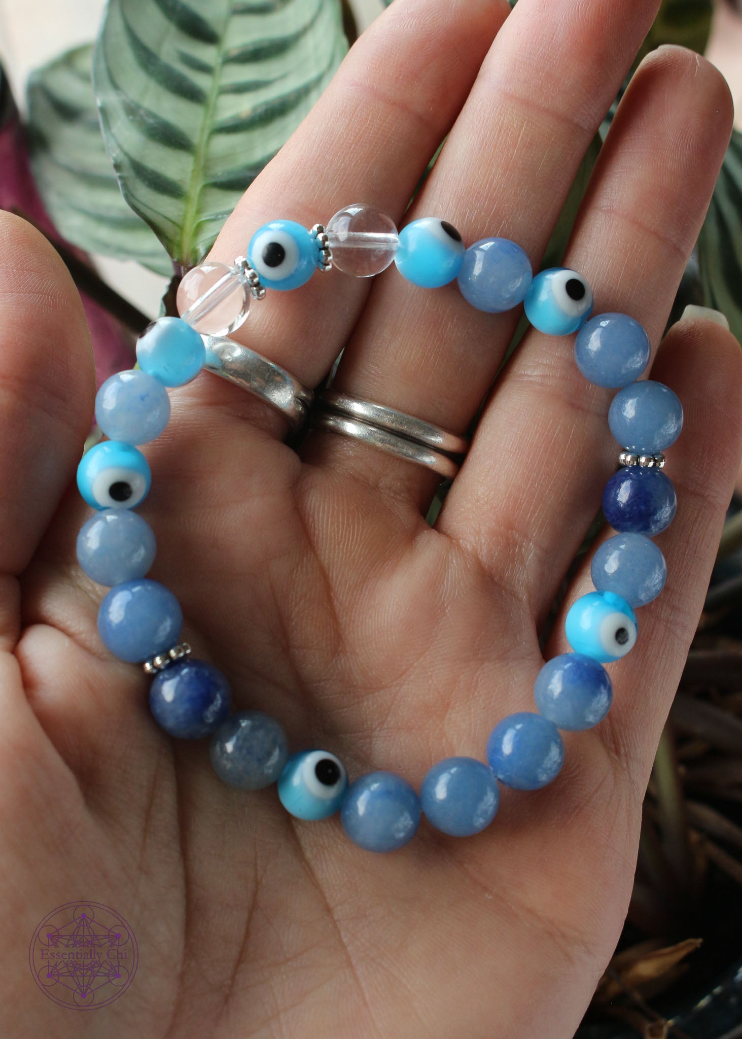 Light blue evil eye stretch bracelet with clear quartz and blue aventurine 8mm beads. 