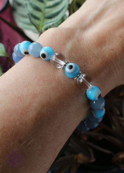 Light blue evil eye stretch bracelet with clear quartz and blue aventurine 8mm beads. 