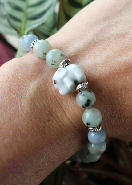 kiwi jasper and angelite stretch bracelet with an accent elephant lampwork focal bead. 