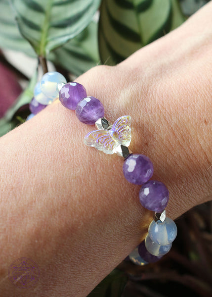 faceted amethyst and opalite stretch bracelet with an acrylic iridescent focal bead. 