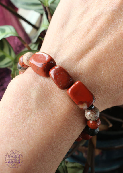 chunky red jasper bracelet has three rectangular tumble focal beads with 8mm brecciated red jasper beads to support your root chakra. 