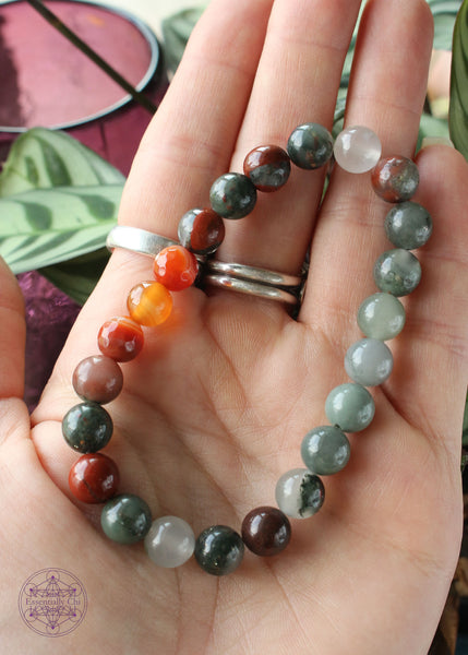 crystal stretch bracelet with carnelian beads and african bloodstone 8mm beads.