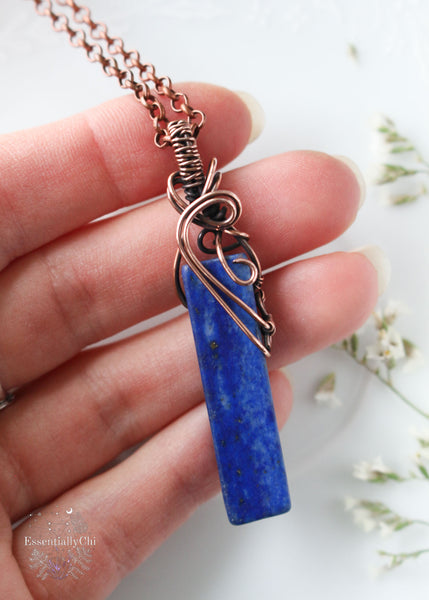 Harmonize your empathic soul with our Lapis Lazuli Copper Pendant. Enhancing intuition and emotional clarity, this exquisite piece is a conduit for transformative energy healing, aligning your essence for a balanced life