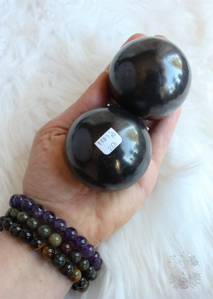 Shungite Meaning - it is known as the Miracle Stone, it is a protection crystal that blocks negative energy, and a grounding crystal associated with the root chakra. Shungite helps block EMF's and can help clear and align all your chakras. Shungite can help you excel in your spiritual growth by calming an overactive mind and releasing worry, stress, and fears. Shungite helps calm the mind to bring inner peace and harmony. Shungite is associated with the zodiacs Scorpio, Capricorn, and Cancer.